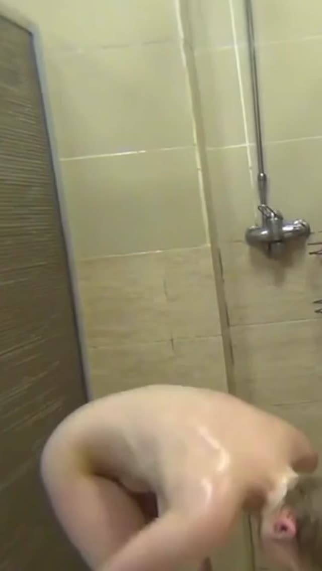 Cute Blonde Washing In Shower